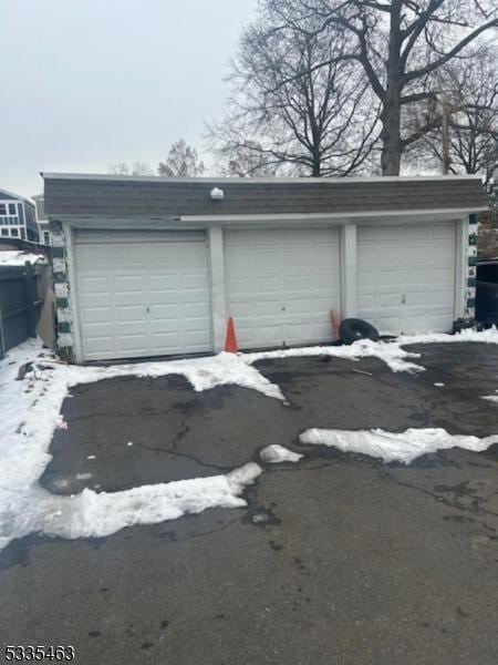 view of snow covered garage