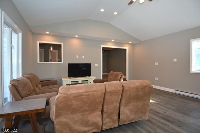 living room with lofted ceiling, a baseboard heating unit, dark hardwood / wood-style flooring, and ceiling fan