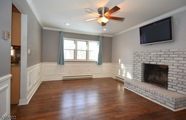 unfurnished living room with crown molding, a baseboard heating unit, and dark hardwood / wood-style floors