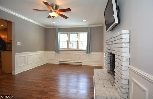 unfurnished living room with ornamental molding, dark hardwood / wood-style flooring, a fireplace, and baseboard heating