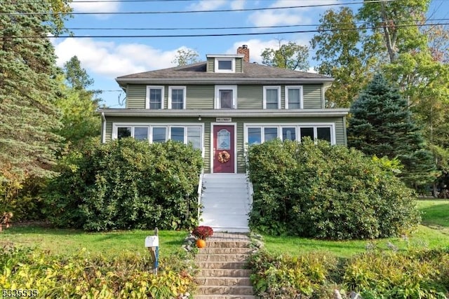 view of front of house with a front yard