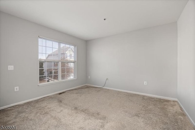 empty room with carpet floors