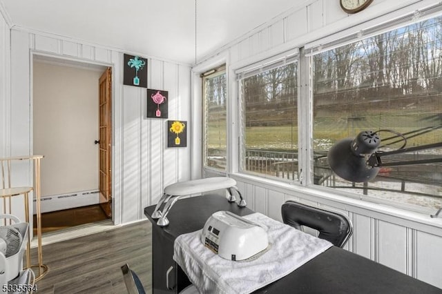 sunroom / solarium featuring a baseboard radiator