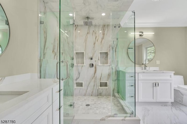 bathroom with crown molding, vanity, toilet, and a shower with shower door