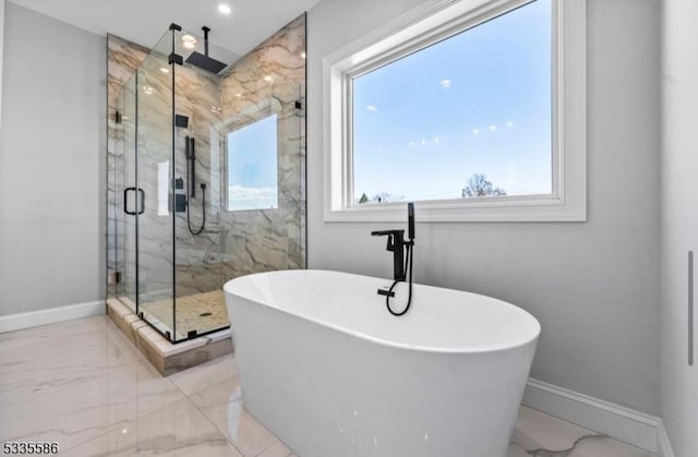 bathroom featuring plus walk in shower