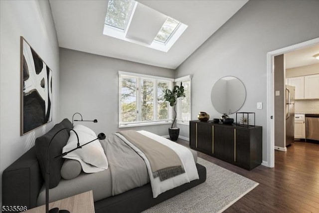 bedroom with stainless steel refrigerator, dark hardwood / wood-style flooring, and vaulted ceiling with skylight