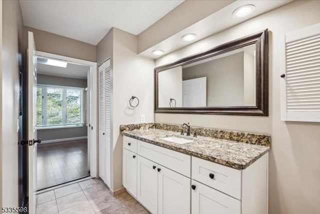 bathroom featuring vanity and tile patterned floors