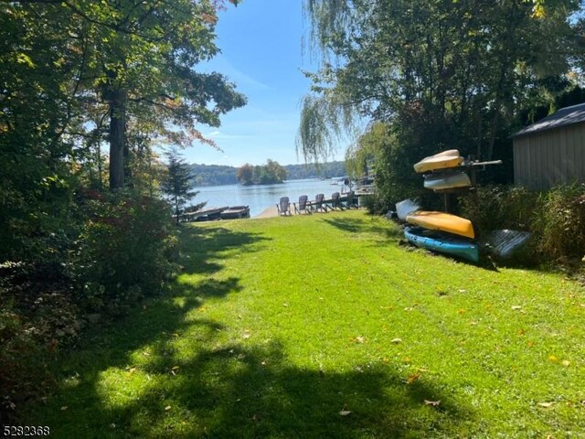 view of yard with a water view