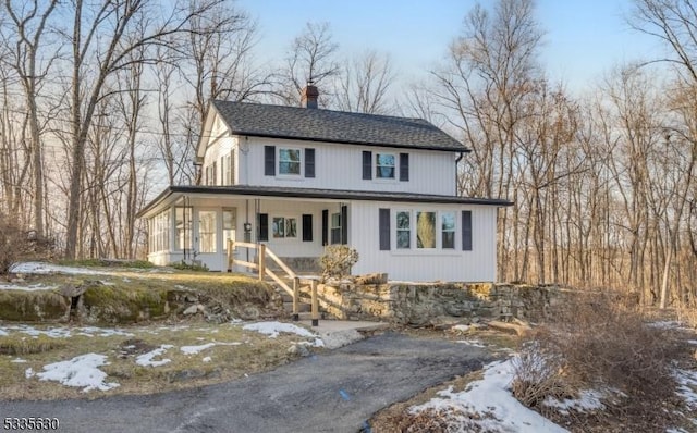 view of front of property featuring covered porch