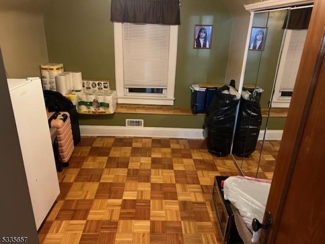 interior space featuring light parquet floors