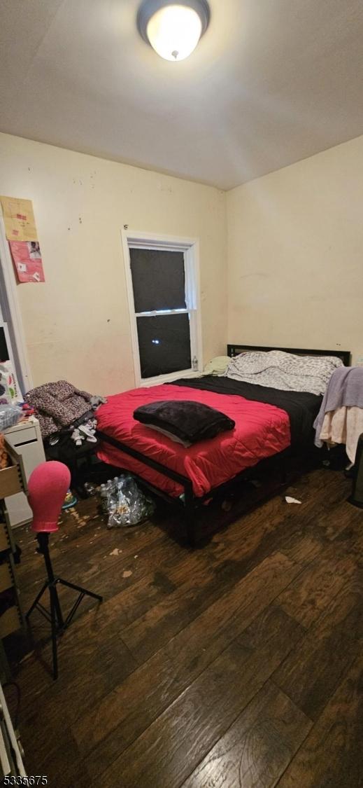 bedroom featuring hardwood / wood-style flooring