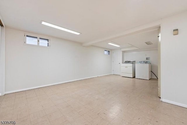 basement with washing machine and clothes dryer