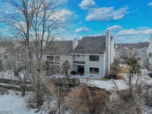 view of snow covered property