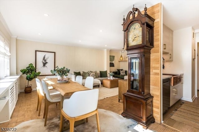 dining space with light parquet flooring