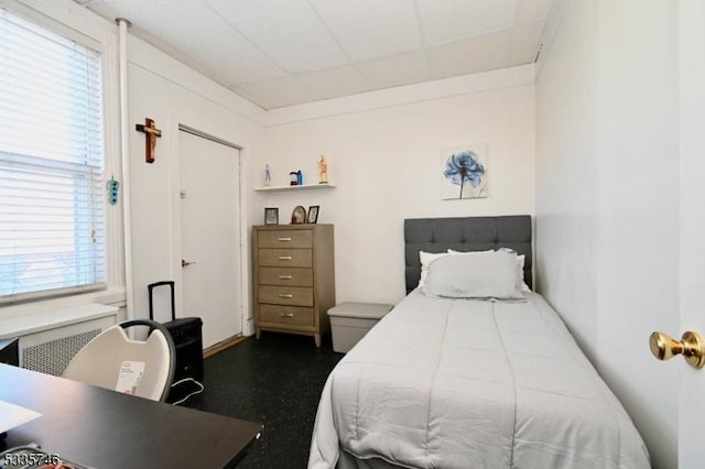 bedroom featuring radiator heating unit