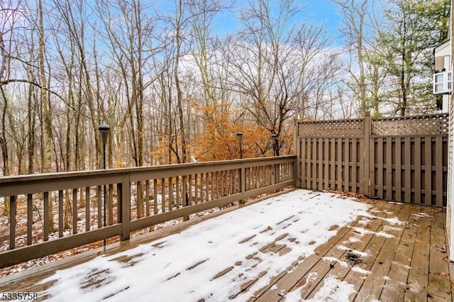 view of snow covered deck