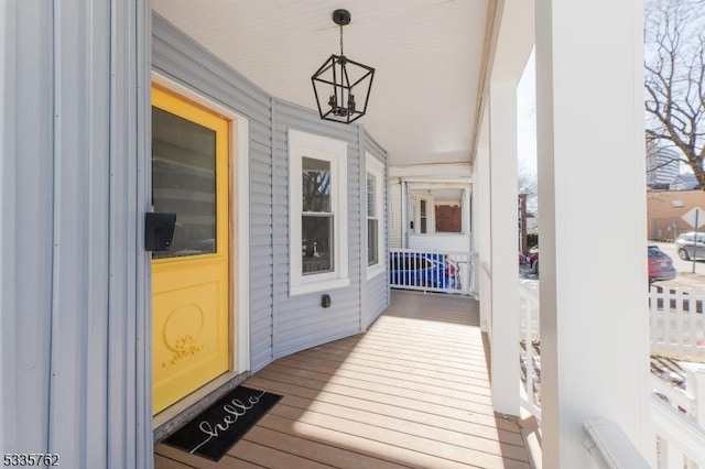 doorway to property featuring a porch