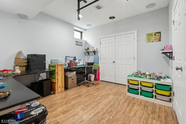 office area featuring hardwood / wood-style floors