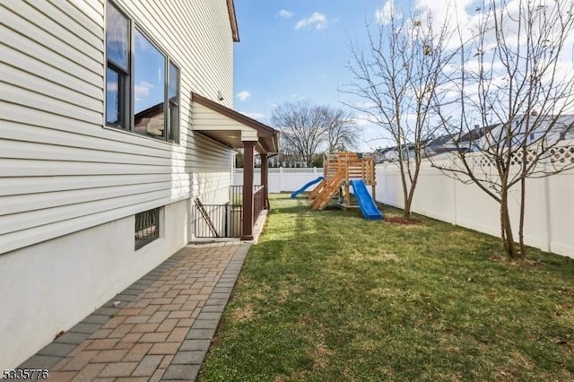 view of yard featuring a playground