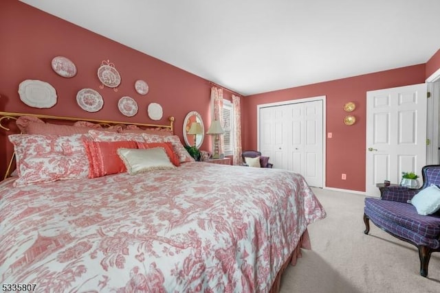 carpeted bedroom with a closet