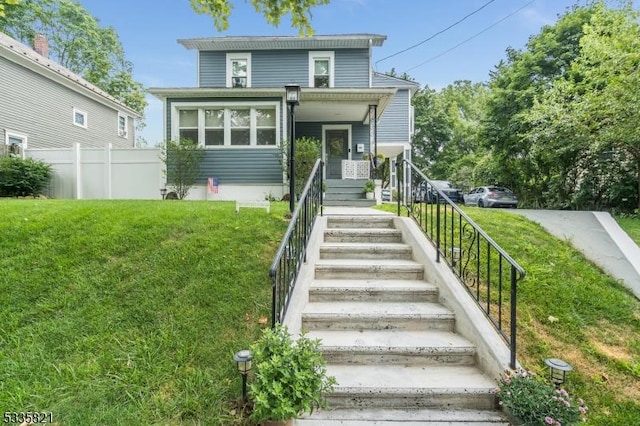 view of front of house with a front lawn