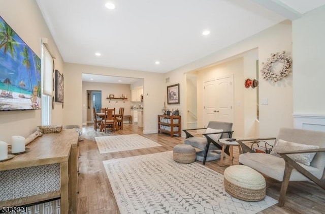 living area with light hardwood / wood-style flooring