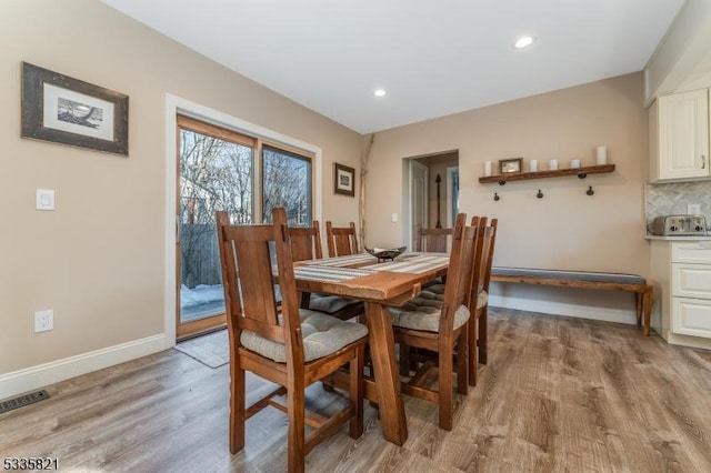 dining room featuring light wood-type flooring