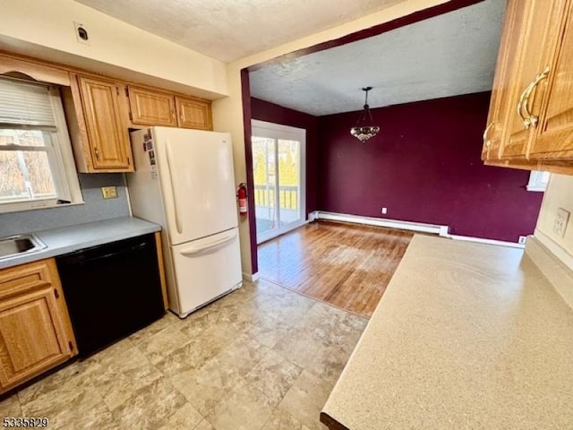 kitchen featuring a healthy amount of sunlight, white fridge, black dishwasher, and baseboard heating