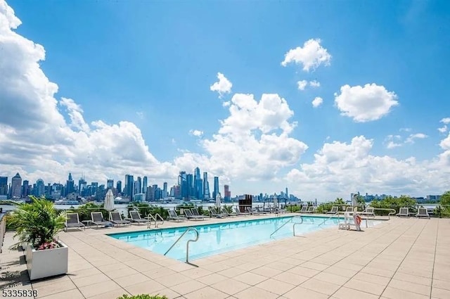 view of swimming pool featuring a patio