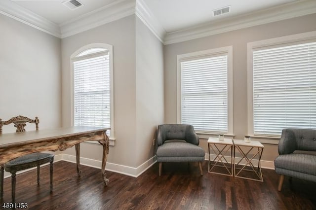 living area with ornamental molding and dark hardwood / wood-style flooring