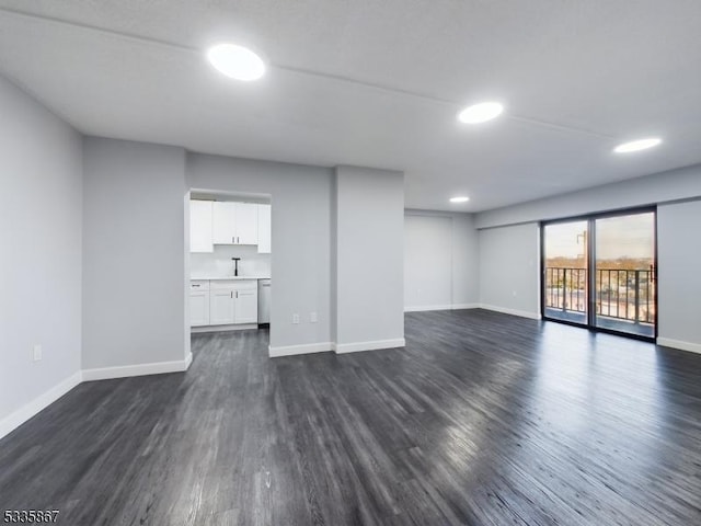 interior space with dark hardwood / wood-style flooring