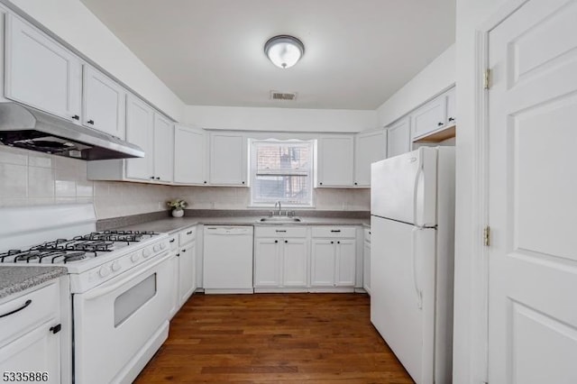 kitchen featuring sink, white cabinetry, dark hardwood / wood-style flooring, white appliances, and backsplash