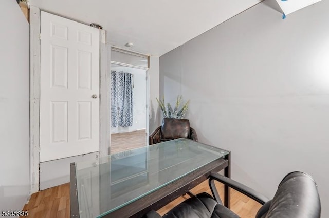 office with hardwood / wood-style floors