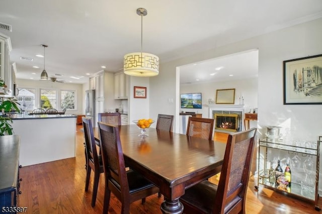 dining area featuring hardwood / wood-style flooring