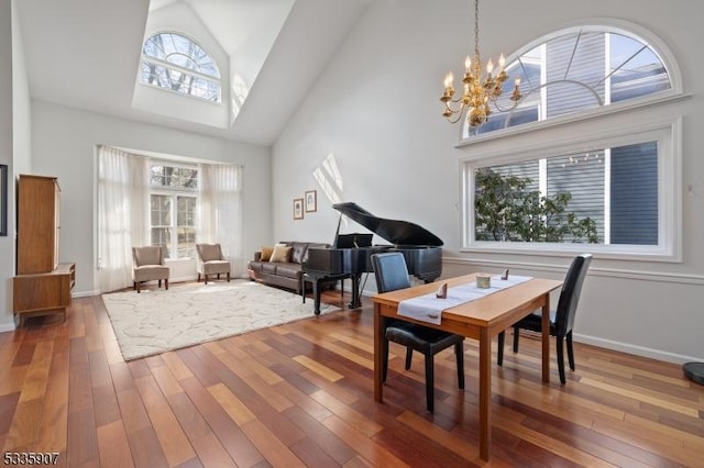 sitting room with a wealth of natural light and wood-type flooring