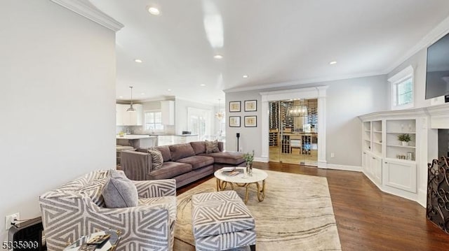 living room with ornamental molding and dark wood-type flooring