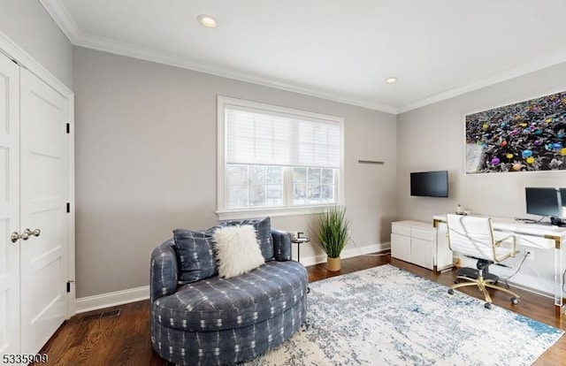 home office featuring ornamental molding and dark hardwood / wood-style floors