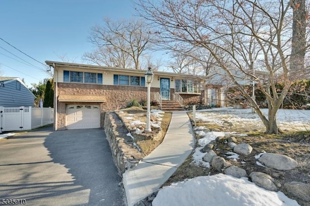 view of front of home with a garage