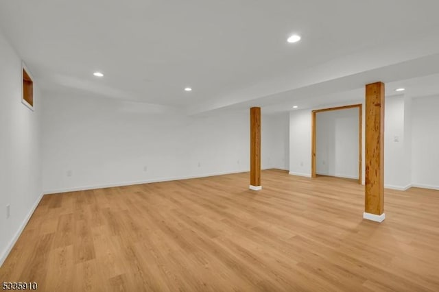 basement featuring light hardwood / wood-style flooring