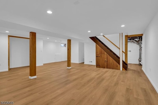 basement featuring light hardwood / wood-style floors