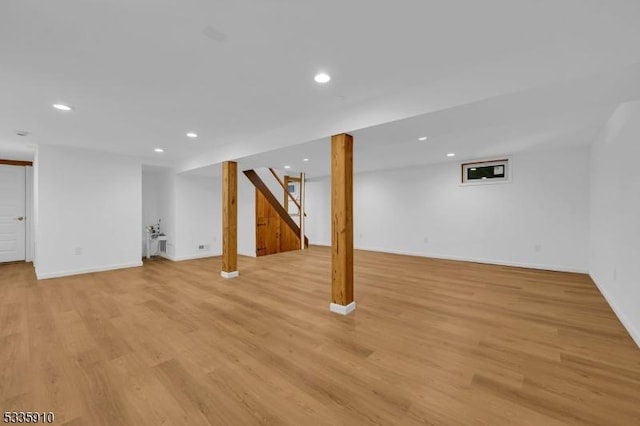 basement featuring light hardwood / wood-style flooring