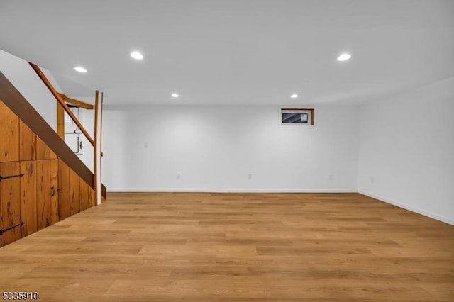 basement featuring light wood-type flooring