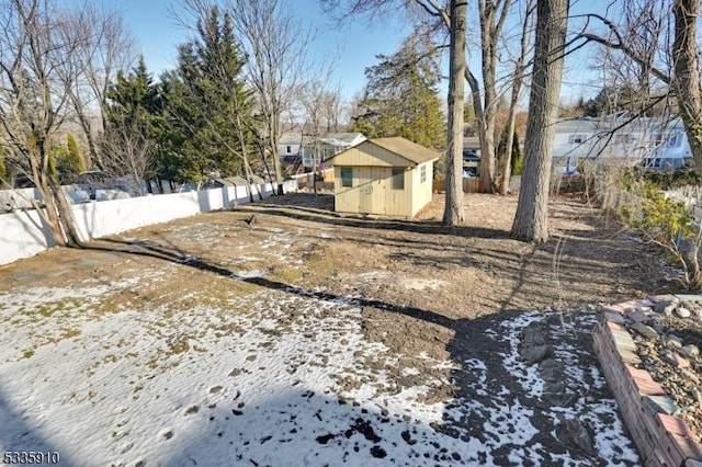 view of yard covered in snow