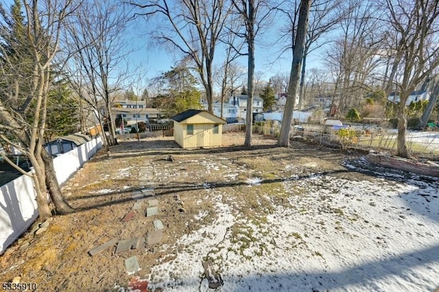 view of yard covered in snow