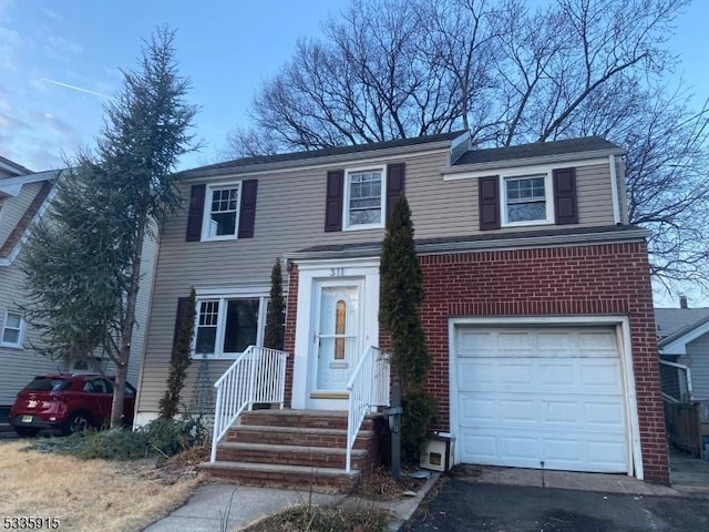 view of front of home featuring a garage