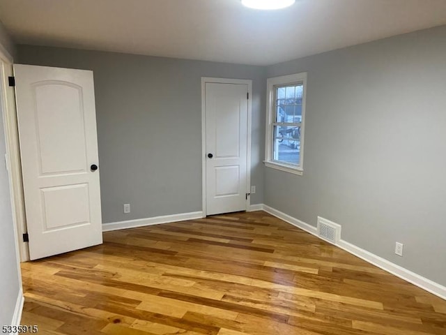 unfurnished bedroom featuring light hardwood / wood-style floors