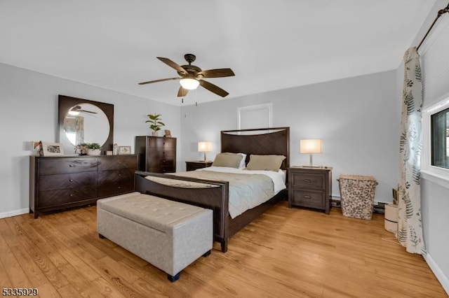 bedroom featuring ceiling fan and light wood-type flooring