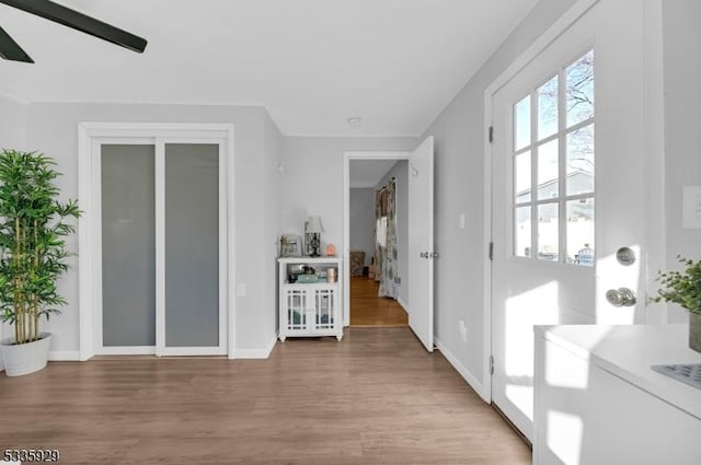 interior space with hardwood / wood-style flooring and ceiling fan