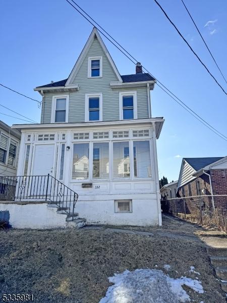 view of front of home with a chimney