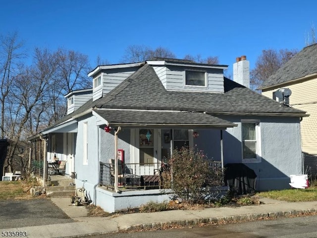 bungalow featuring covered porch